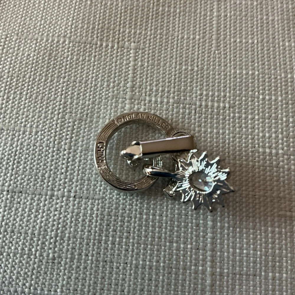 Nolan Miller Silver Tone Glamour Collection Swirl Earrings. - Picture 3 of 7